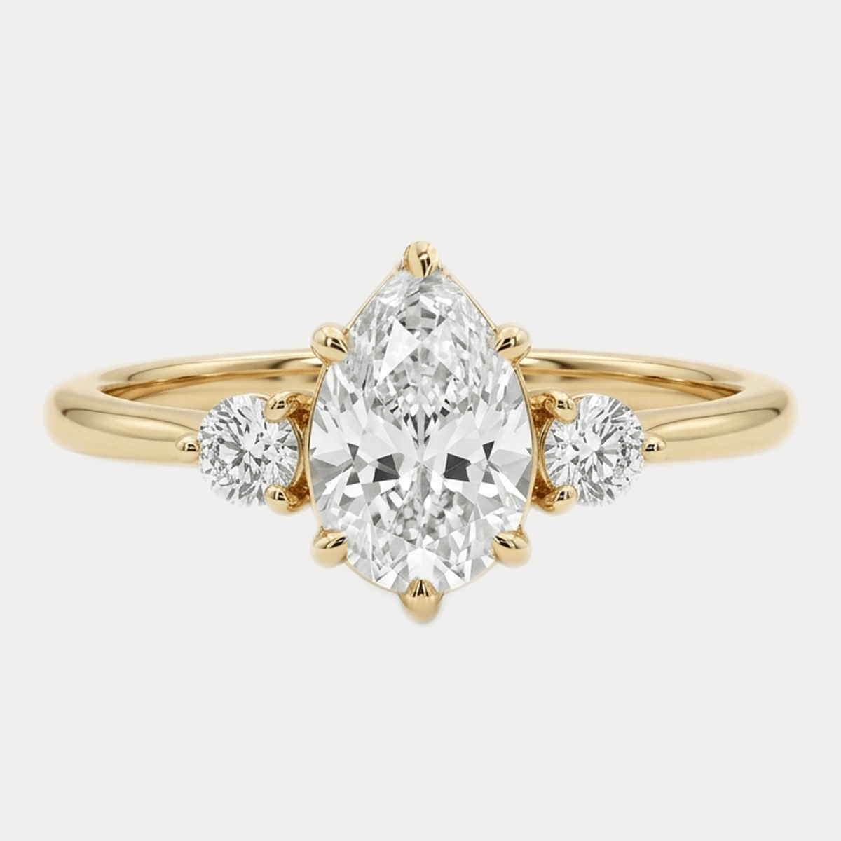 DROP gold ring with a pear-cut diamond and brilliant-cut diamonds, IGI certificate, 0,8ct