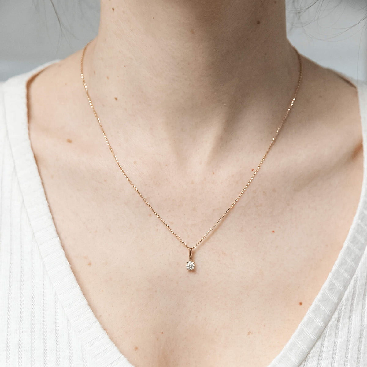 SHINING gold minimalist pendant with a 0.17-0.18ct diamond