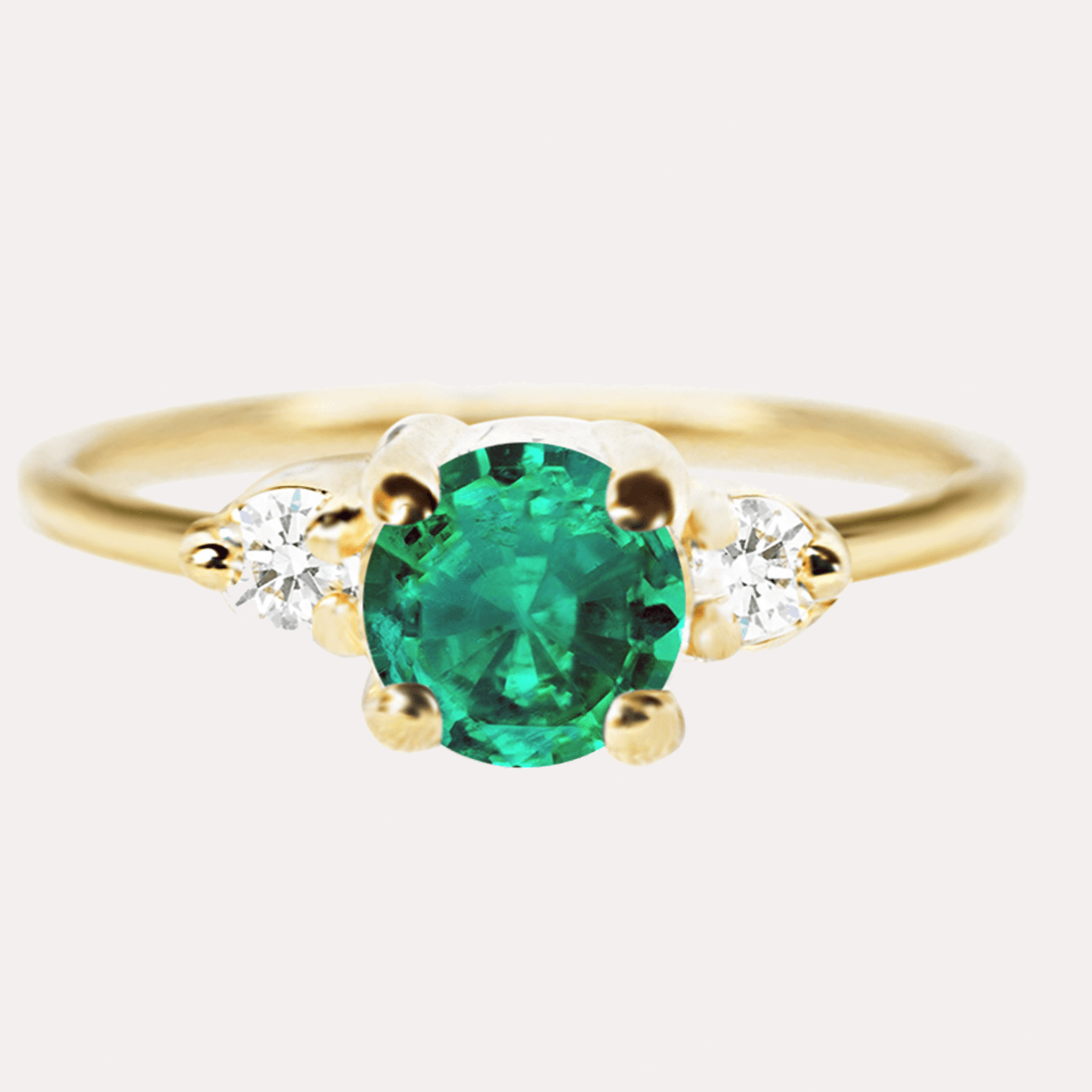 MENUET gold ring with green emerald and diamonds