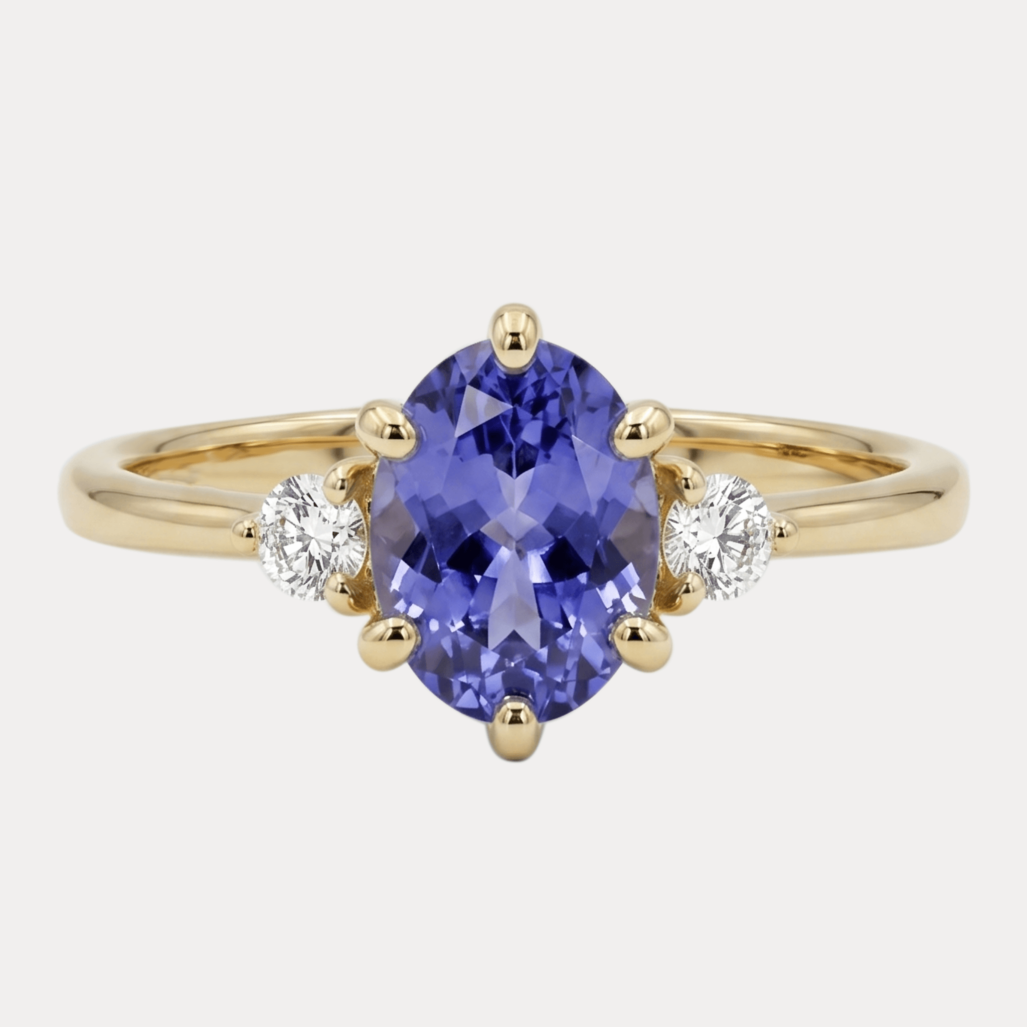 ROSA gold ring with oval purple tanzanite and diamonds