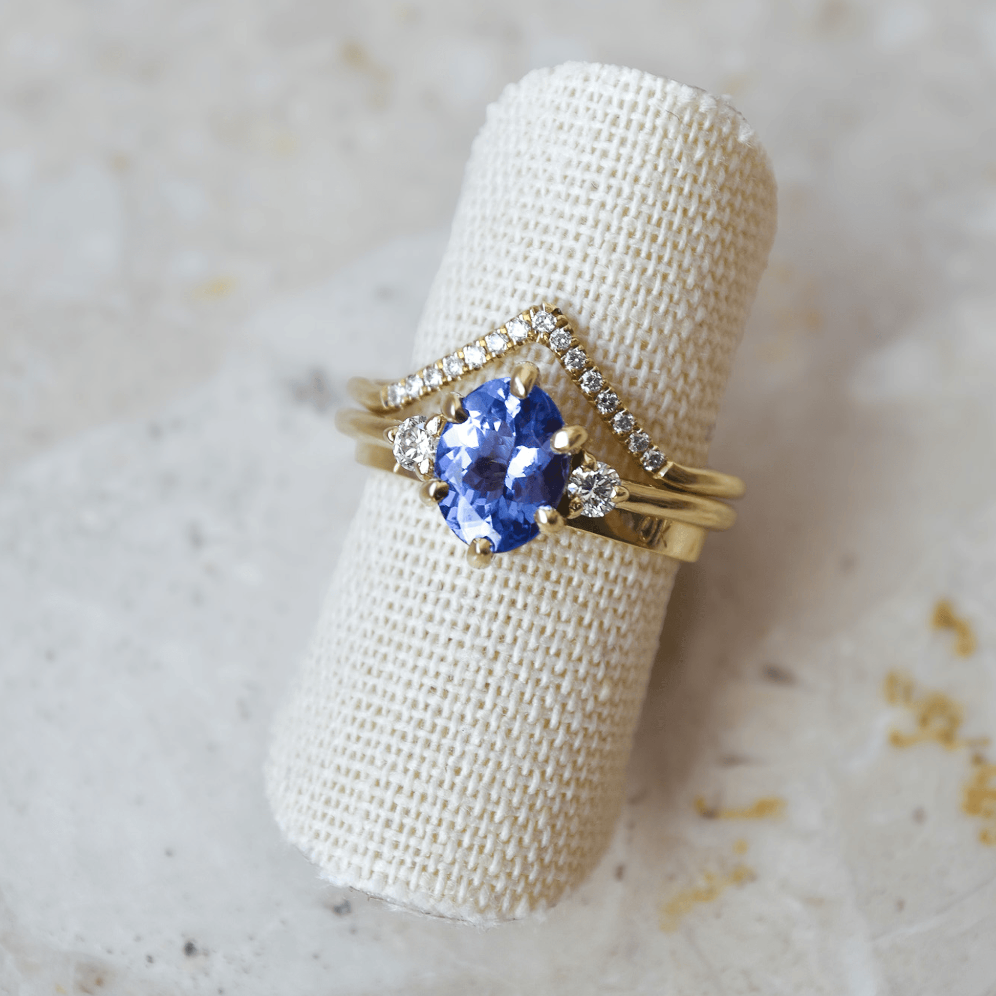 ROSA gold ring with oval purple tanzanite and diamonds