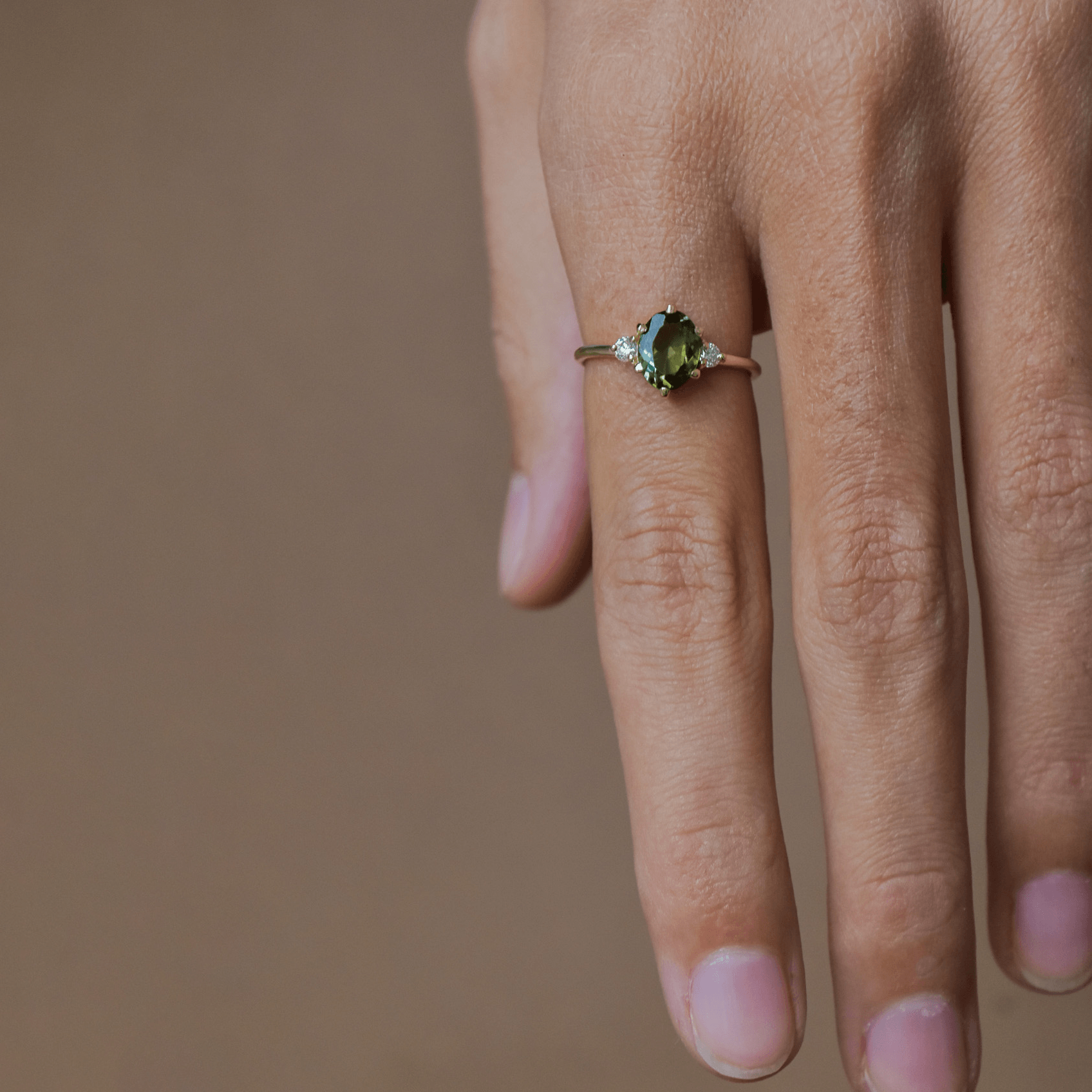 ROSA gold ring with oval purple tanzanite and diamonds