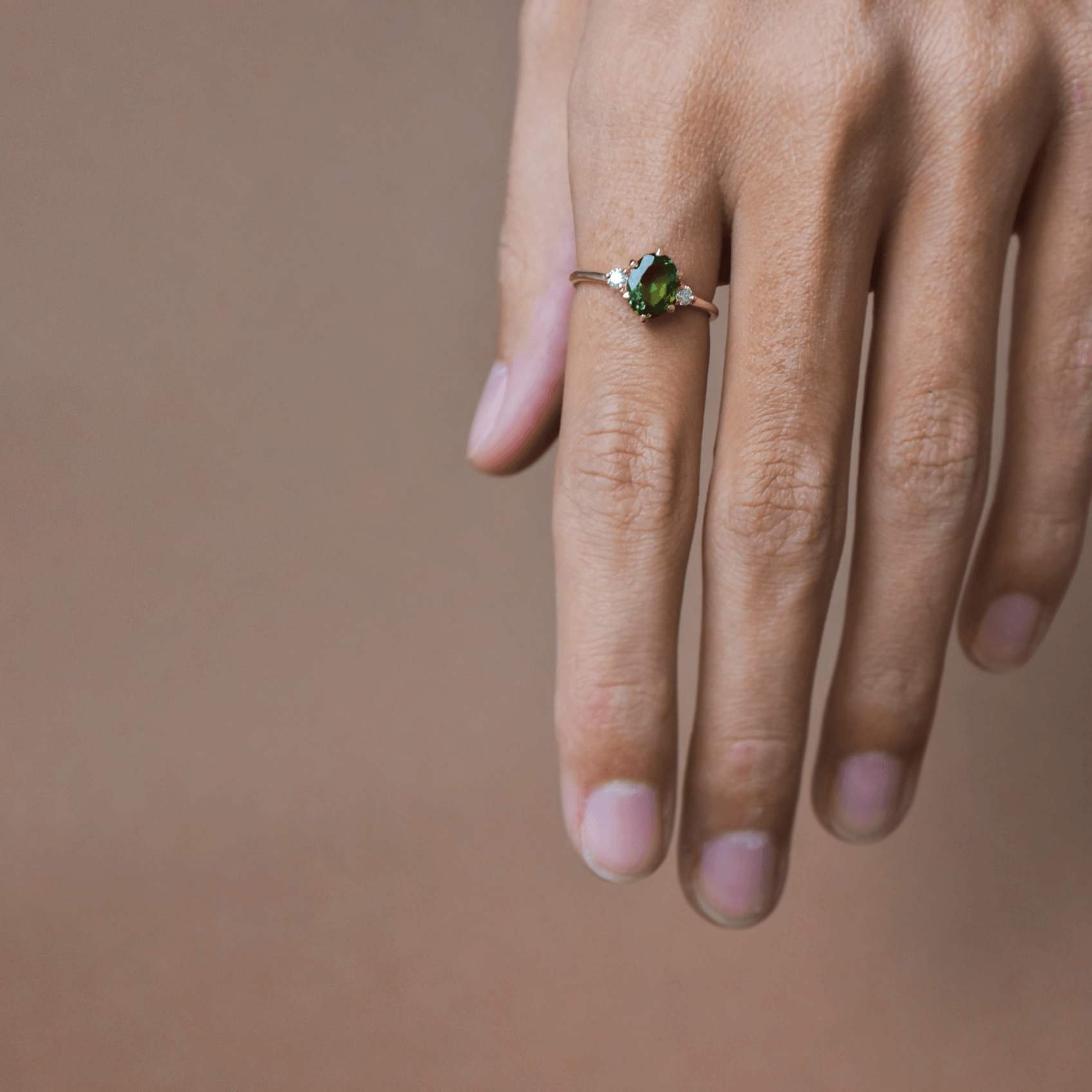 ROSA gold ring with oval purple tanzanite and diamonds